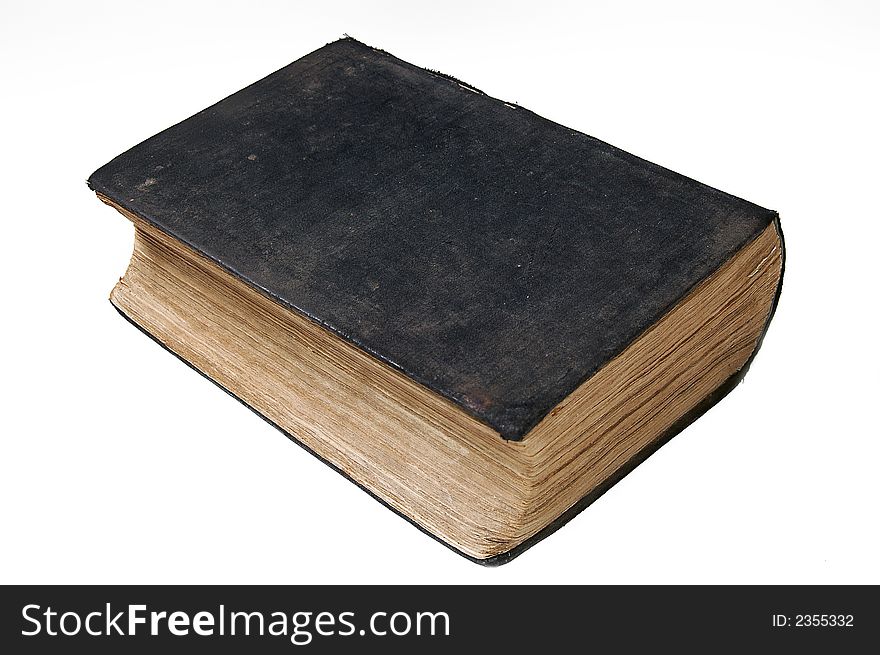 A very old closed book on white background. A very old closed book on white background