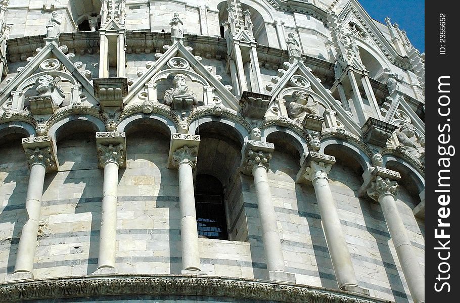 The baptistery of Pisa - facade detail (Italy). The baptistery of Pisa - facade detail (Italy)