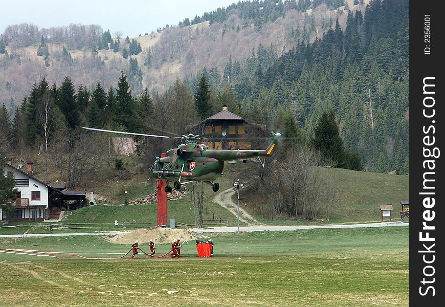 Fire-fighter And Helicopter