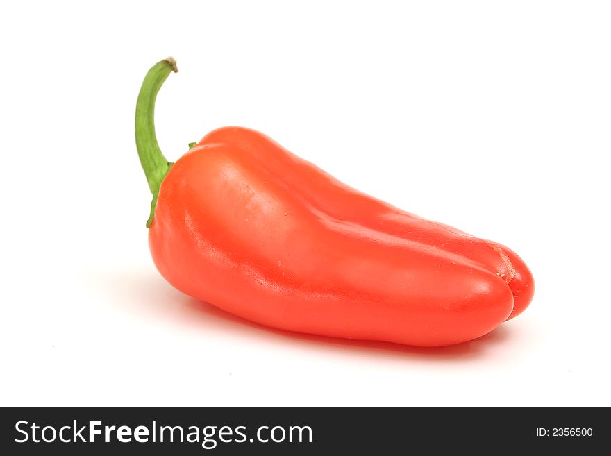 Photo of a isolated mini red bell pepper on white