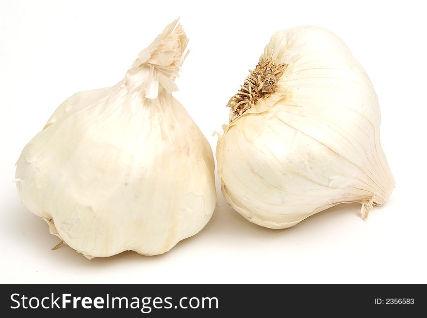 Photo of a isolated garlic bulbs   on white. Photo of a isolated garlic bulbs   on white