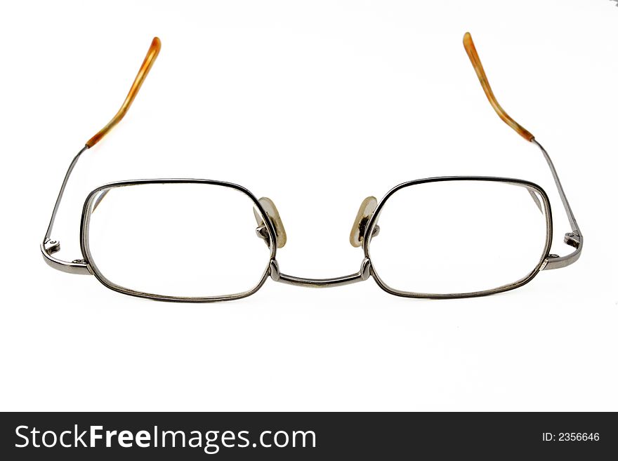 Pair of spectacles on white background