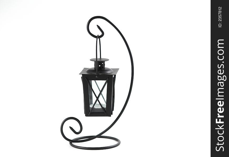 Isolated black lantern and candle with white background