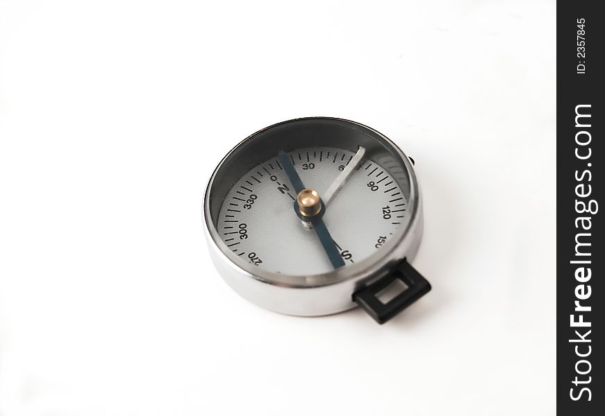 Closeup of isolated compass with white background