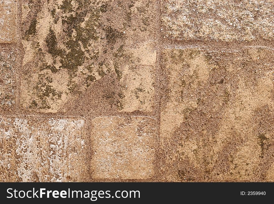 Old wall with dark stones