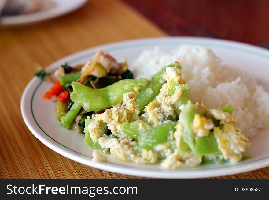 Stir-fried vegetables on steamed rice , Thai style cuisine. Stir-fried vegetables on steamed rice , Thai style cuisine