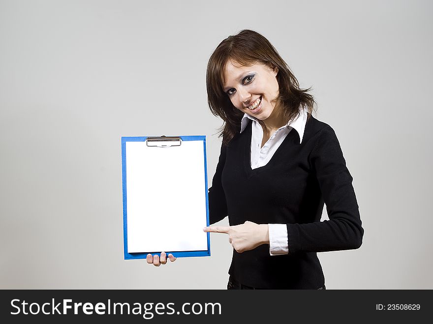 Beautiful girl smiling indicates the document on the background of