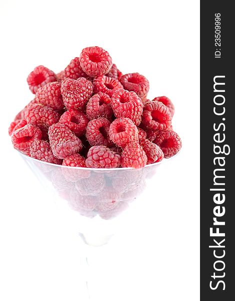 Bowl Of Raspberries Isolated On White