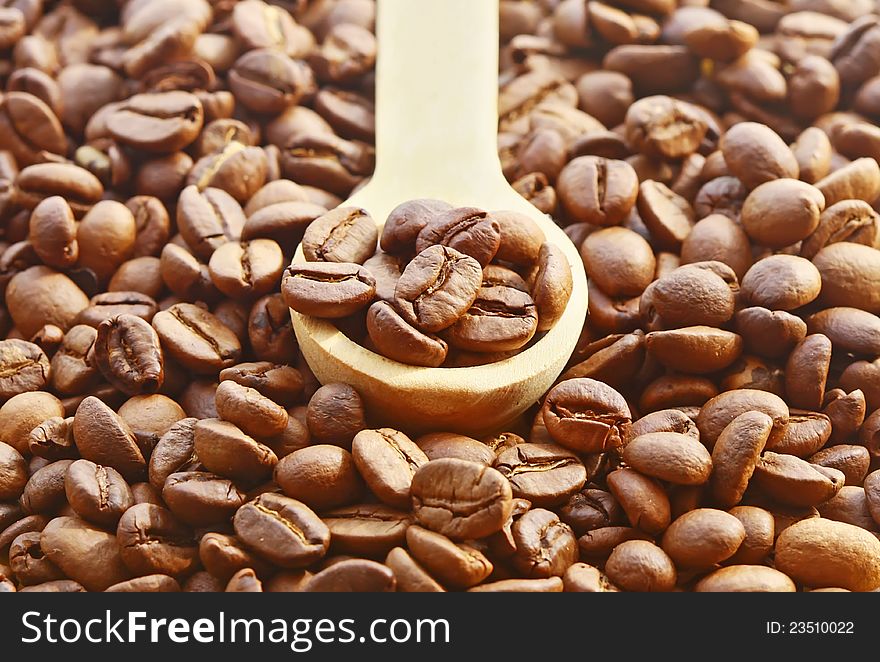 Brown coffee, background texture spoon. Brown coffee, background texture spoon
