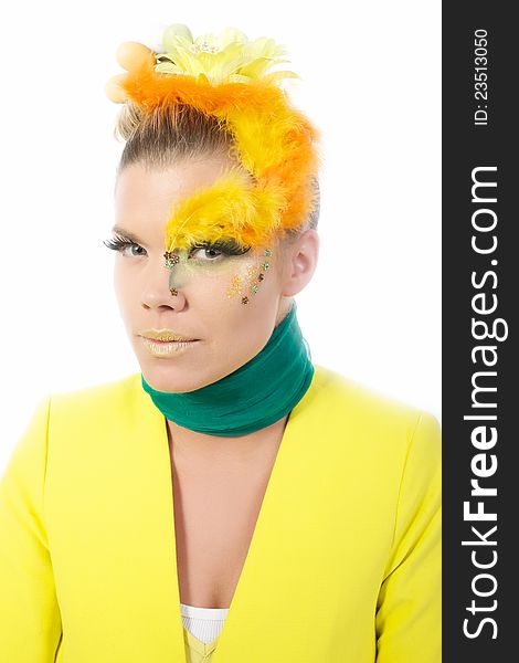 Picture of an easter girl dressed in yellow, with eggs in her hair, on a white, isolated background