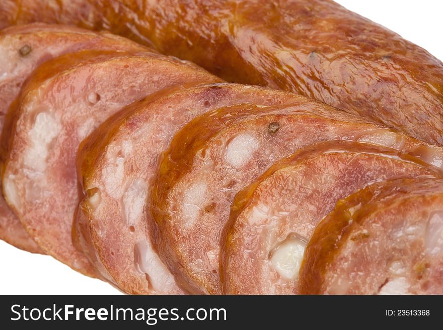 Sliced sausage on a white background isolated. This has a clipping path. Sliced sausage on a white background isolated. This has a clipping path.