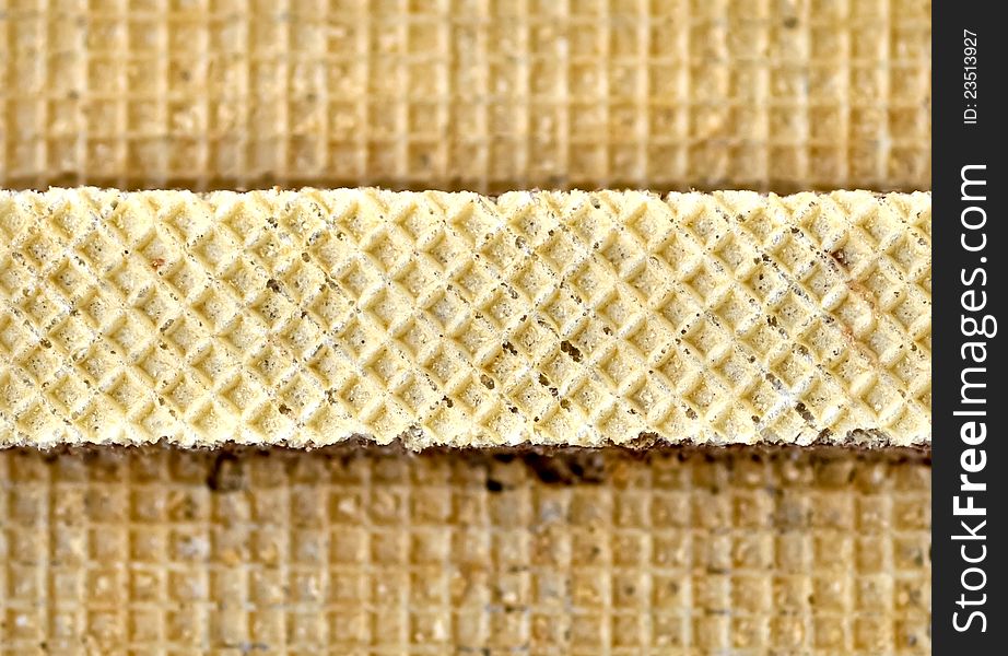 Wafer chocolate bar on top of wafer background. Wafer chocolate bar on top of wafer background