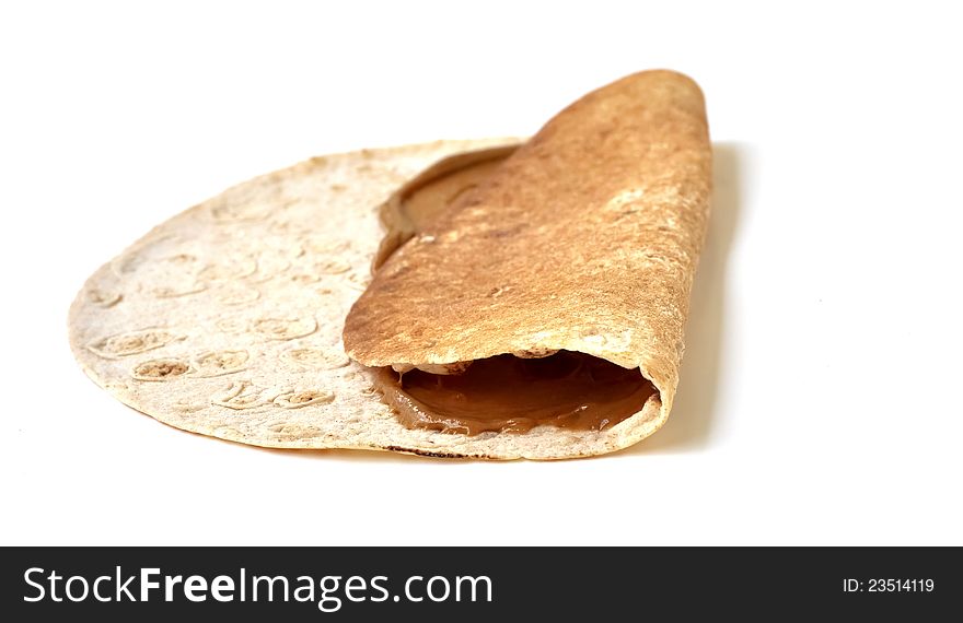 Molasses and sesame paste within a folded loaf of bread. Molasses and sesame paste within a folded loaf of bread