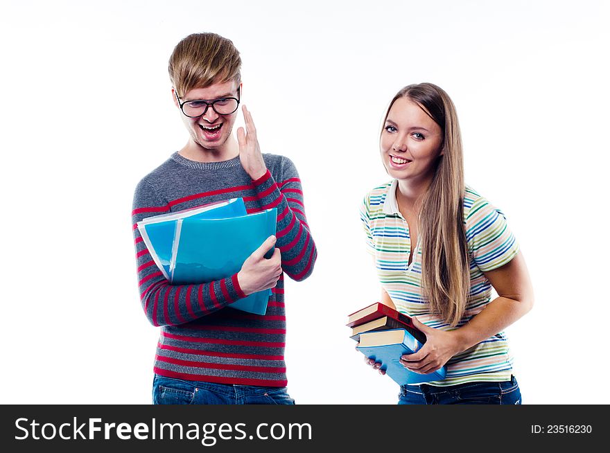 Male and female students laughing together  on white background