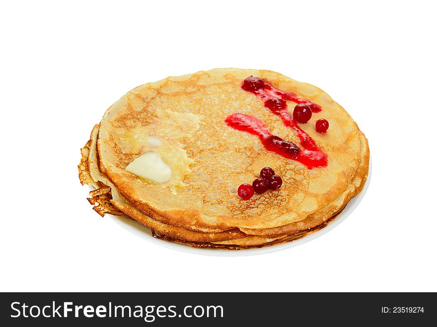 Russian pancake with cranberry and melting butter, on white background