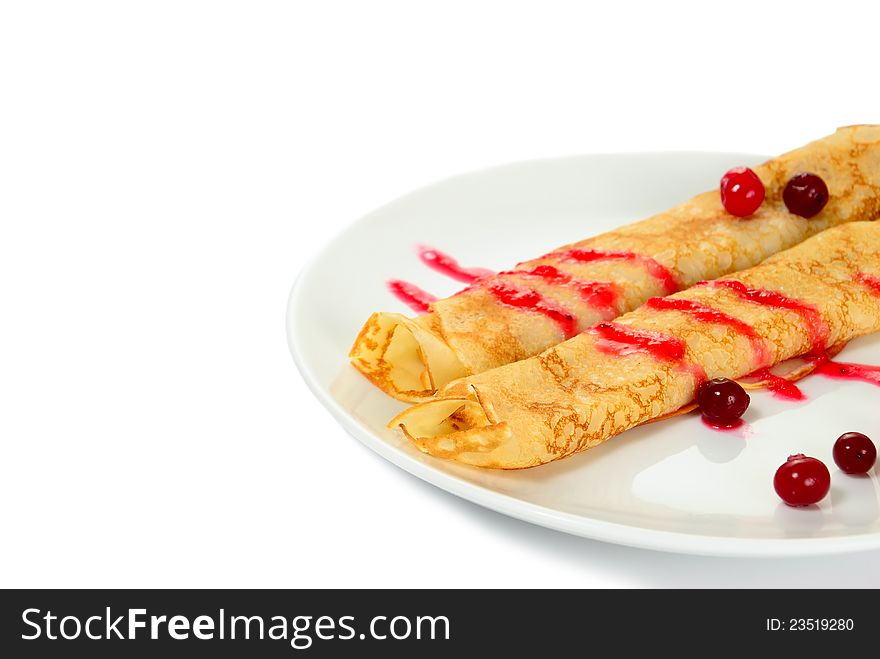 Russian pancake with cranberry,  on white background