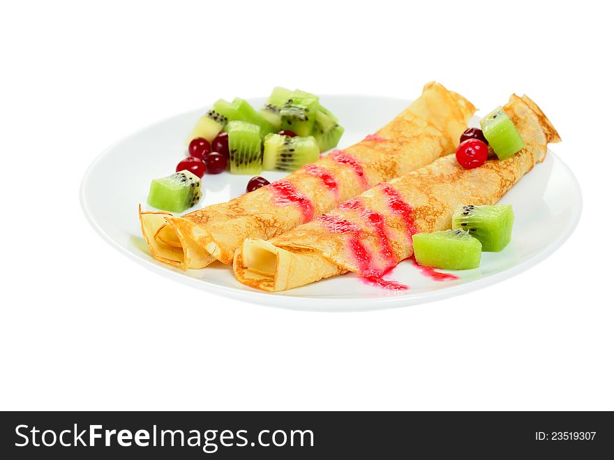 Russian pancake with cranberry and slice kiwi, isolated on white background. Russian pancake with cranberry and slice kiwi, isolated on white background