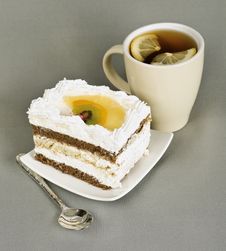 Piece Of Cake With Fruit, Tea With , Spoon Royalty Free Stock Photography Piece Of Cake With Fruit, Tea With , Spoon Royalty Free Stock Photography