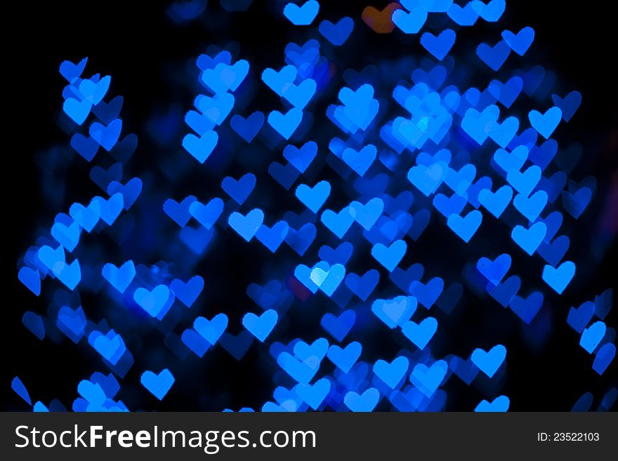 Blurred of heart shape christmas light, Can be used as background