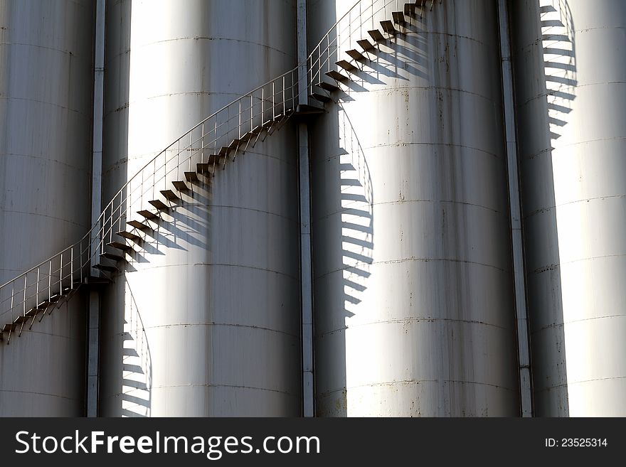 Close up of steel tanks with stairs