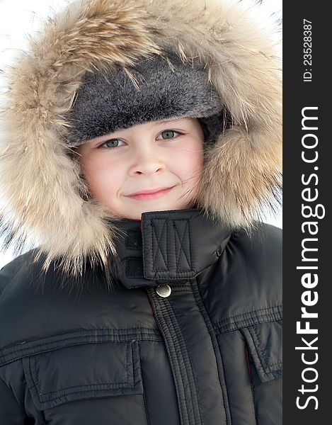 Boy In A Jacket With Fur