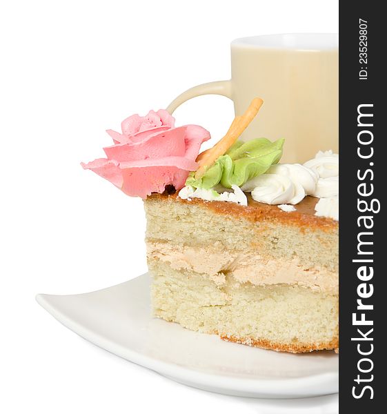 Piece Of Cake With Cream  On A Background A Mug