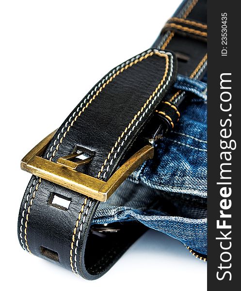 Blue jeans and black leather belt. Blue jeans and black leather belt