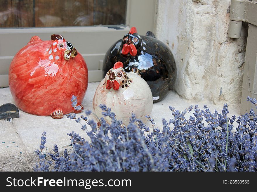 Lavender and ceramic chickens in a gift shop in Provence, France