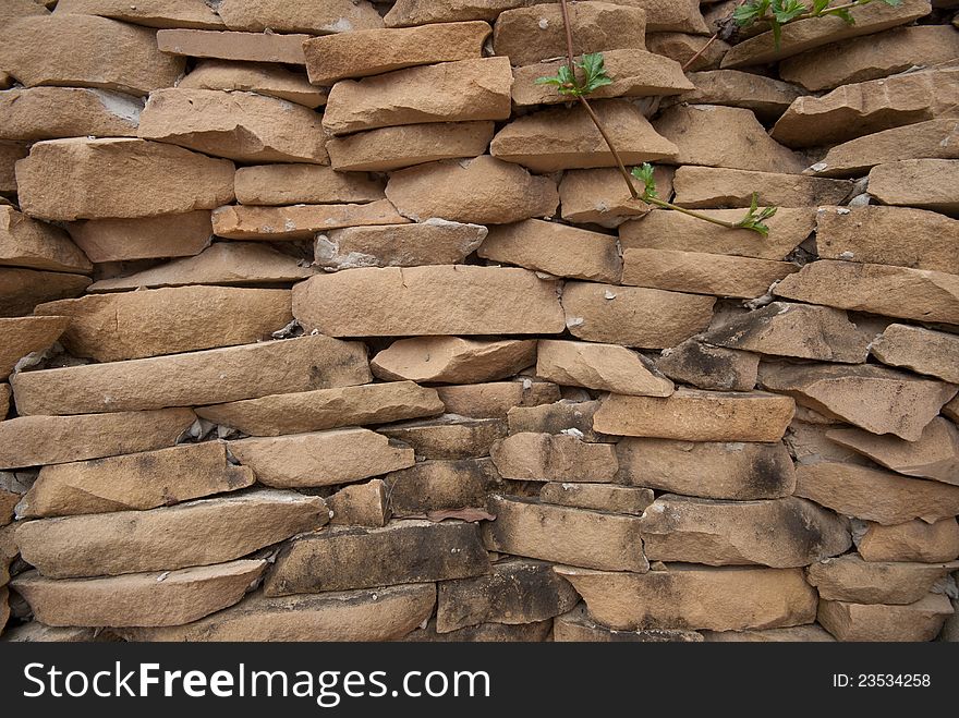 Stone wall in Wat Pha Son Keaw temple, Thailand.