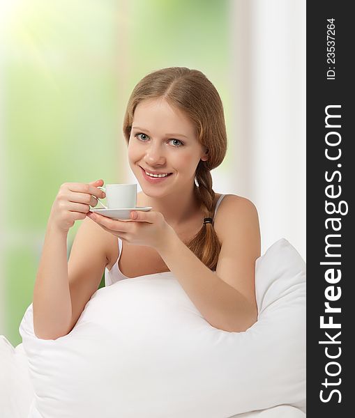 Beautiful Girl Drinking Coffee In Bed