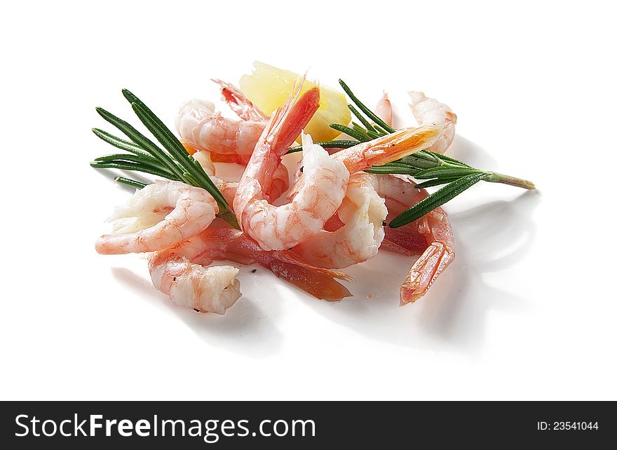 Coldwater shrimps with rosemary and lemon on the white