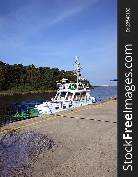 Marine guard ship berthed in the Baltic harbor of Dzwirzyno, Poland