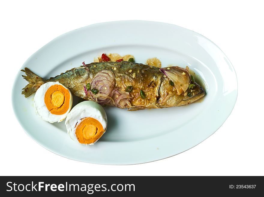 Salt and salted fish dishes on a white background. Salt and salted fish dishes on a white background.