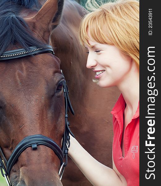 Portrait Of Young Cute Girl  With Her Horse