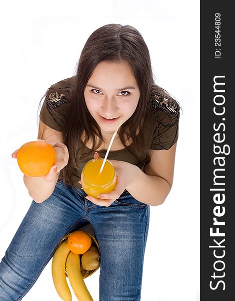 Girl with orange juice and fruit isolated