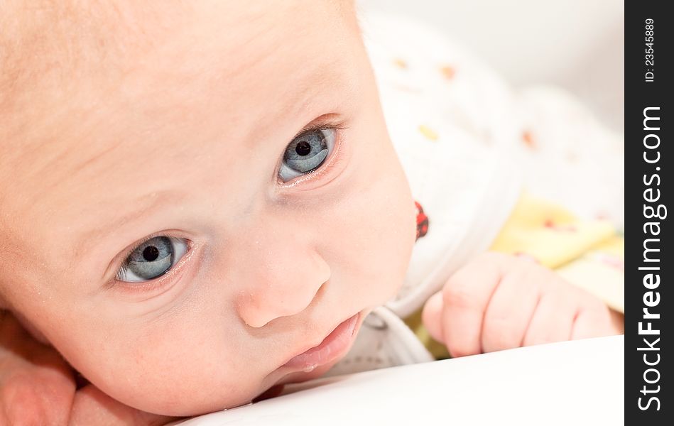 Attentive, pensive and sad sight of a baby. Attentive, pensive and sad sight of a baby