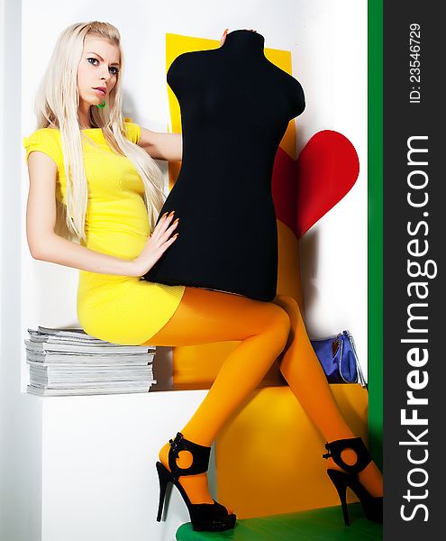 Art portrait of pretty young woman blonde hair with black mannequin - series of photos. Art portrait of pretty young woman blonde hair with black mannequin - series of photos