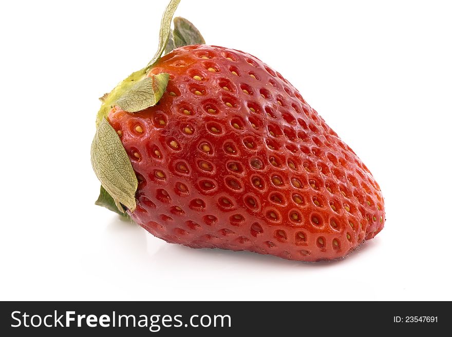 Single fresh red strawberry isolated on white background