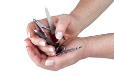 The Hands Holding A  Manicure Set Royalty Free Stock Photography