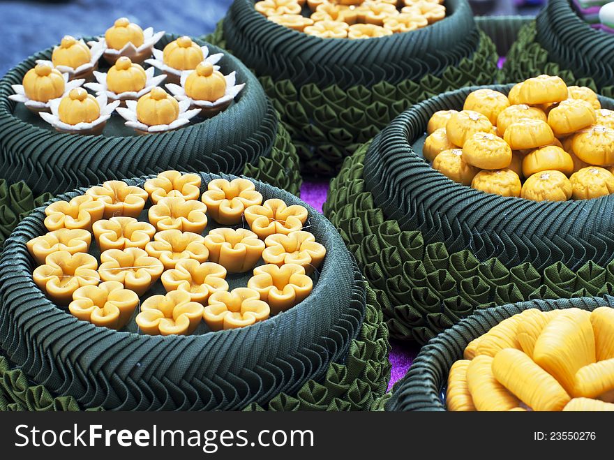 A variety of Thai desserts arranged nicely in bowls made from banana leaves. A variety of Thai desserts arranged nicely in bowls made from banana leaves