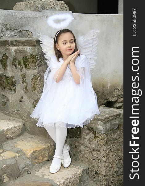 Girl dressed as an angel. Girl dressed as an angel