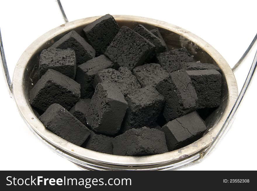 For hookah coals in an iron plate on a white background. For hookah coals in an iron plate on a white background