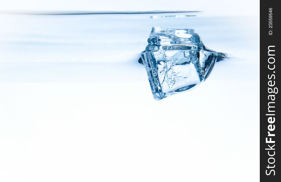 Ice cube in water
