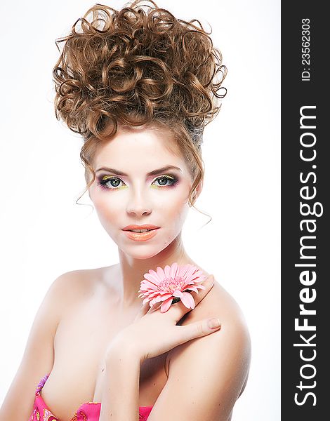 Close-up beauty portrait of caucasian young female brunette with festive hairstyle. Close-up beauty portrait of caucasian young female brunette with festive hairstyle