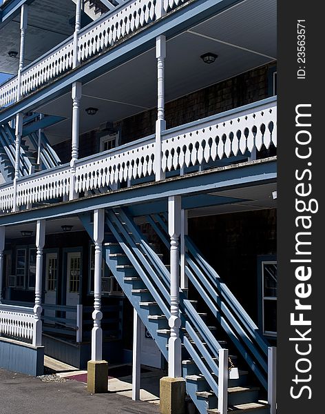 Old fashioned wooden double decks on this building in  Cape Cod, Massachusetts. Old fashioned wooden double decks on this building in  Cape Cod, Massachusetts.