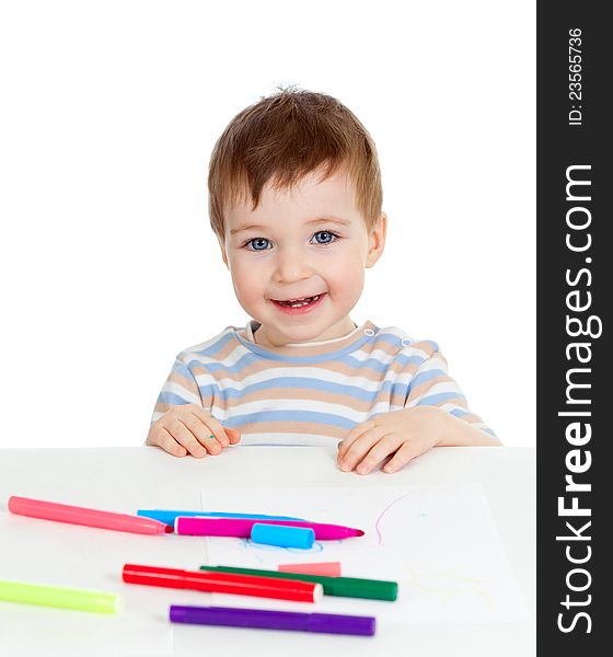 Attractive baby boy with color felt pen. Attractive baby boy with color felt pen