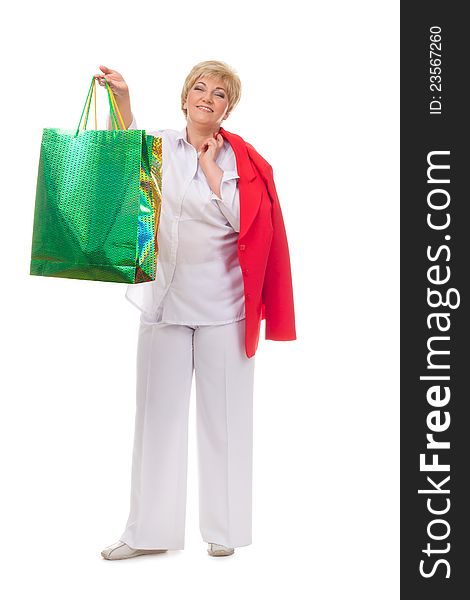 Portrait of a smiling adult woman with shopping bags isolated against white background. Portrait of a smiling adult woman with shopping bags isolated against white background