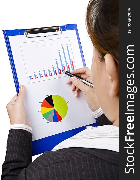A portrait of business woman looking at business chart. A portrait of business woman looking at business chart