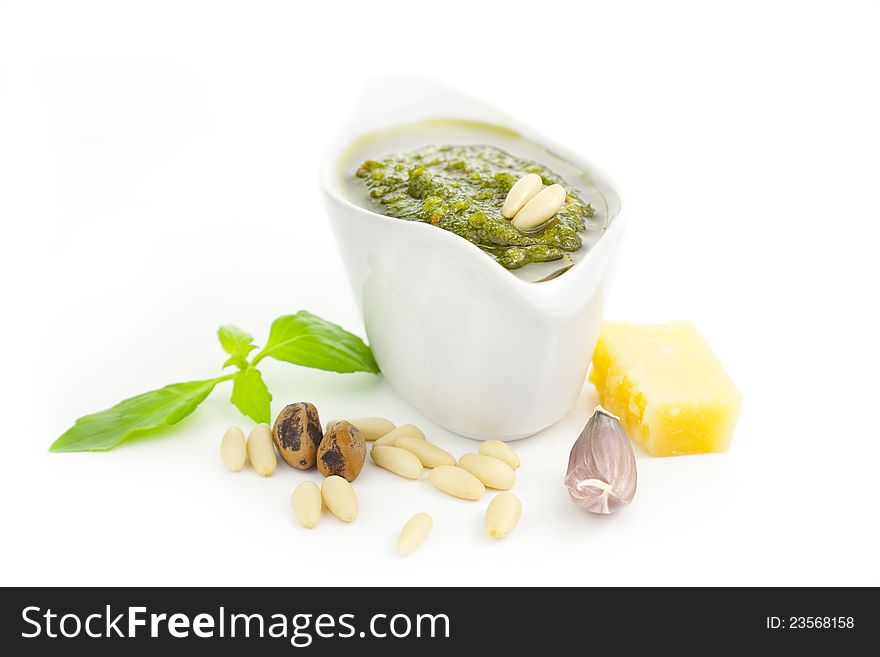 Fresh Pesto and its ingredients / isolated on white