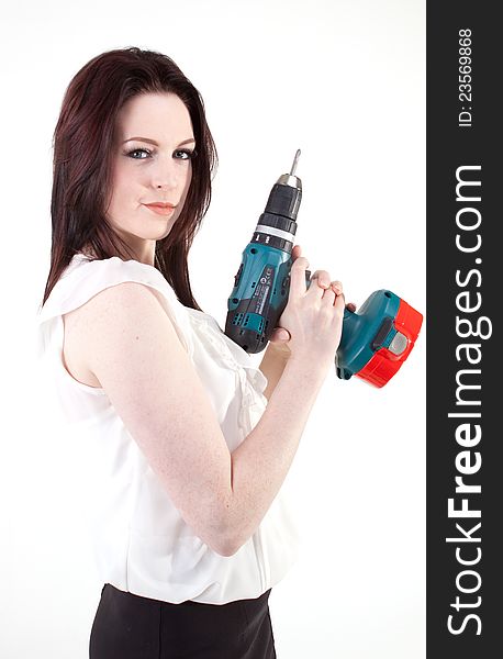 Young brunette posing with drill. Young brunette posing with drill